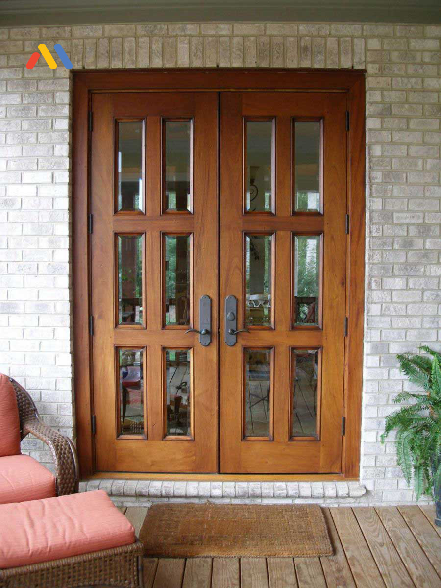 Mẫu cửa gỗ kính 2 cánh đẹp có thể làm từ gỗ tự nhiên hoặc gỗ công nghiệp